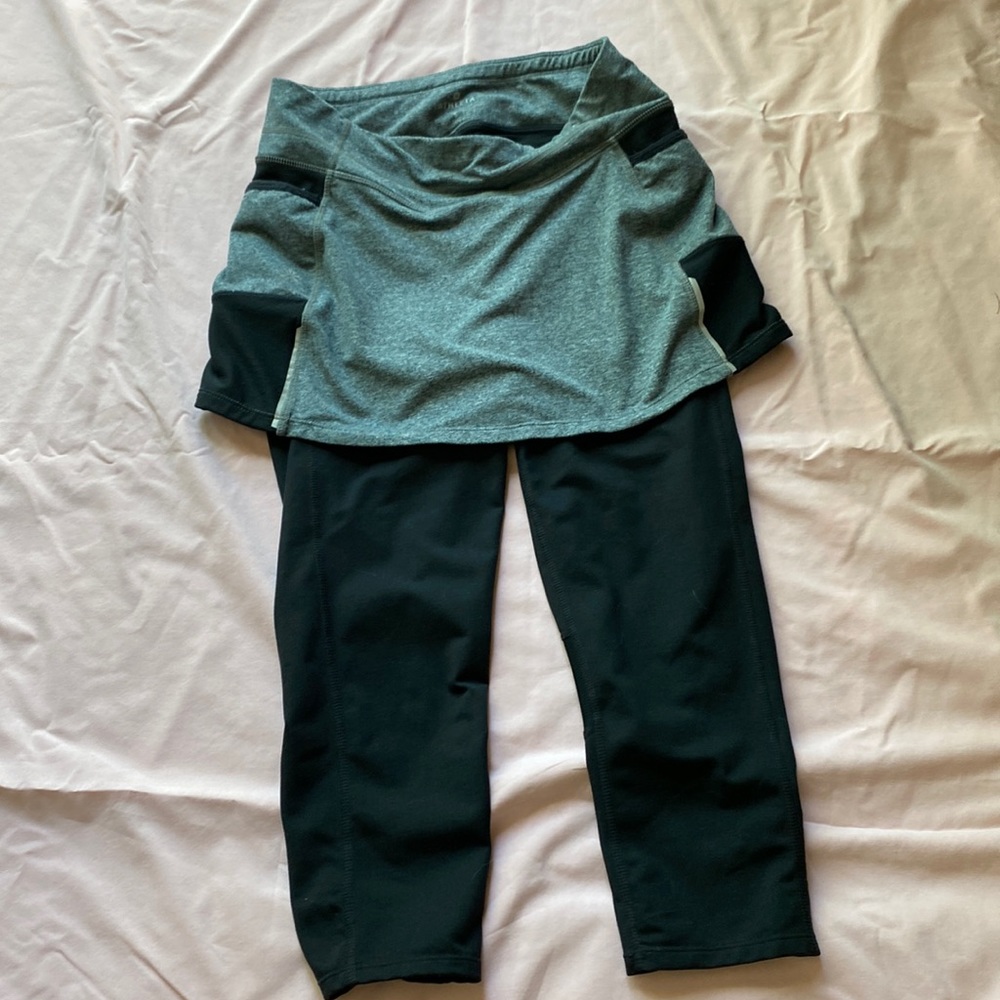 Capri with attached skirt for tennis. Gray and black. Size small.